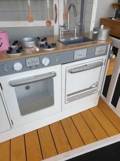 Indoor Large White Wooden Kitchen with Fridge